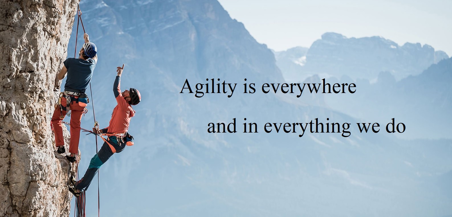 Inspirational image of two climbers ascending, symbolising how Everywhere Agile guides organisations on their path to operational excellence and business agility.